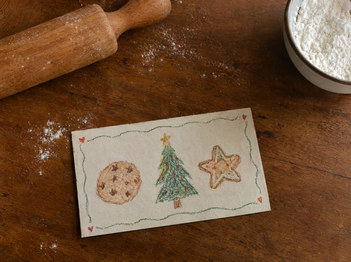 Selbstgebastelter Gutschein mit Zeichnung, weihnachtlich dekoriert